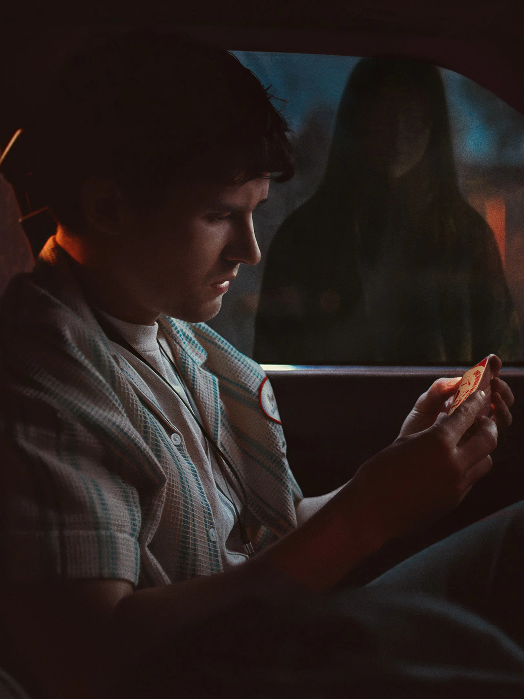 Obsession (2026), Inde Navarrette as Nikki is observing Michael Johnston as Bear